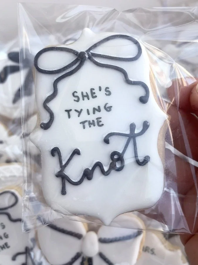She's tying the knot hen party biscuit